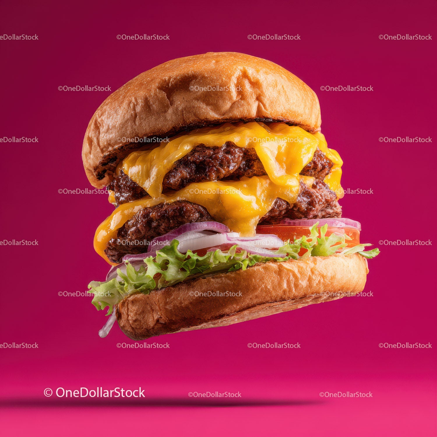 Soczysty cheeseburger z roztopionym serem i świeżymi warzywami