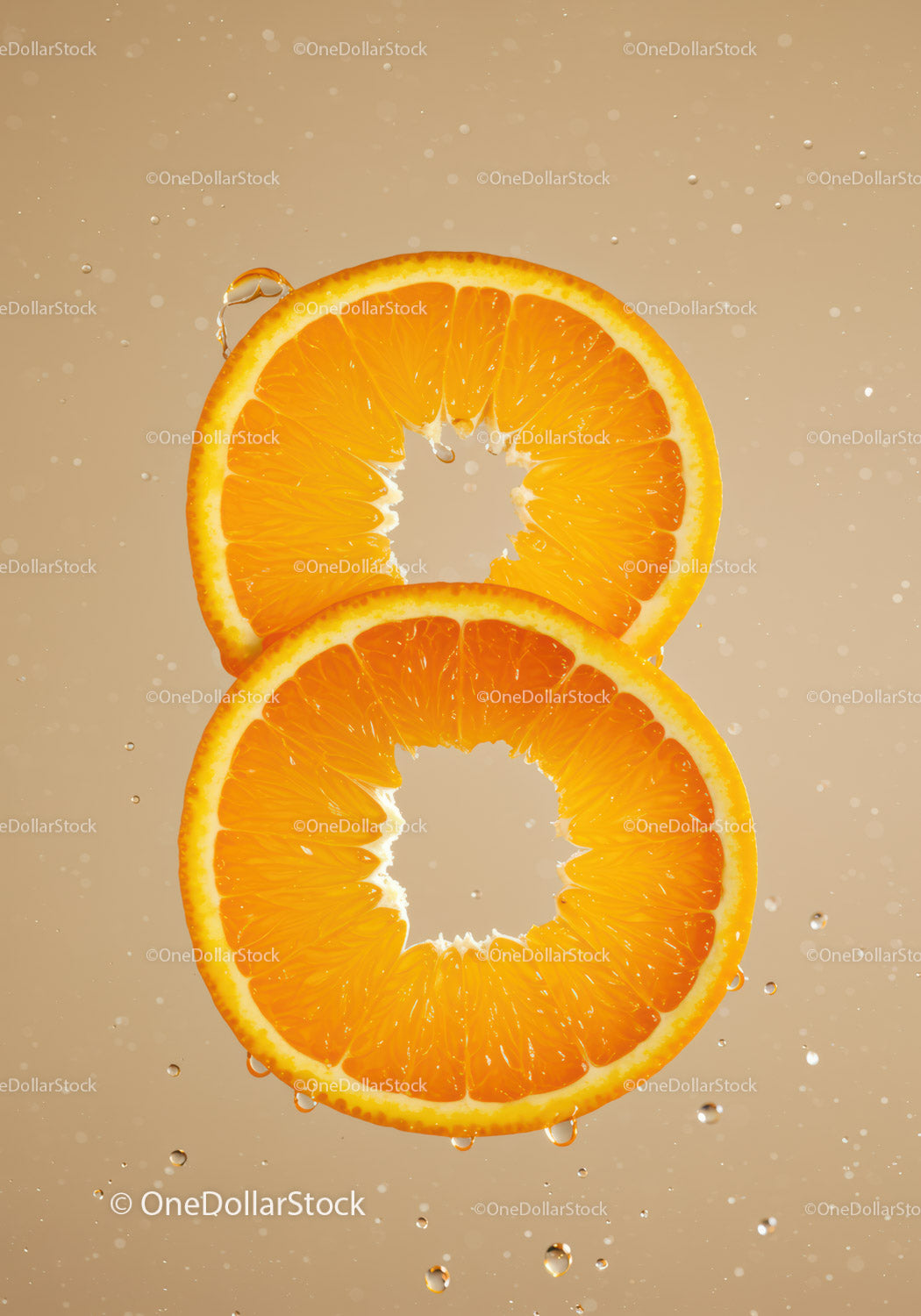 Fresh Orange Slices Immersed in Water Splash