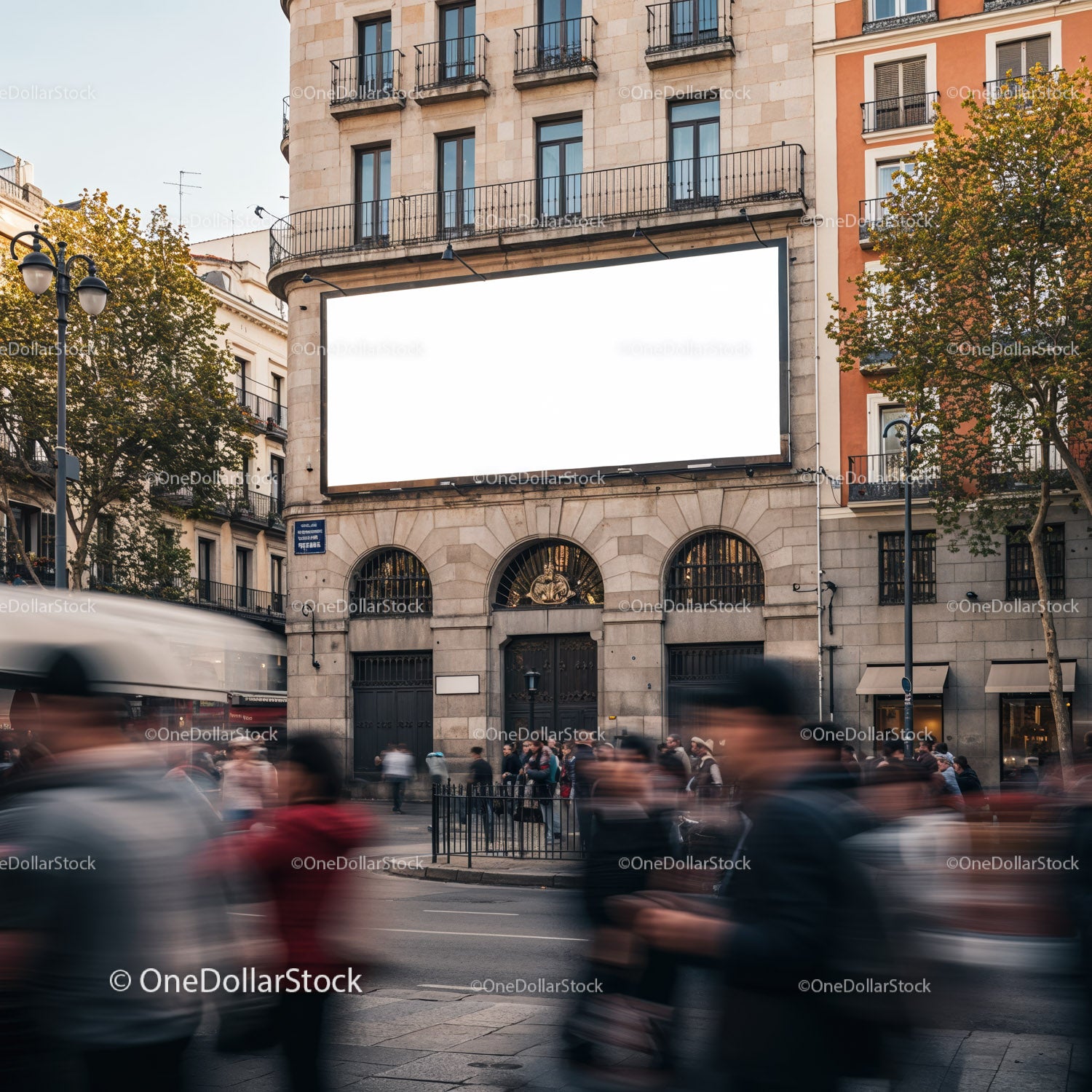 Blank billboard on historic urban building with crowd