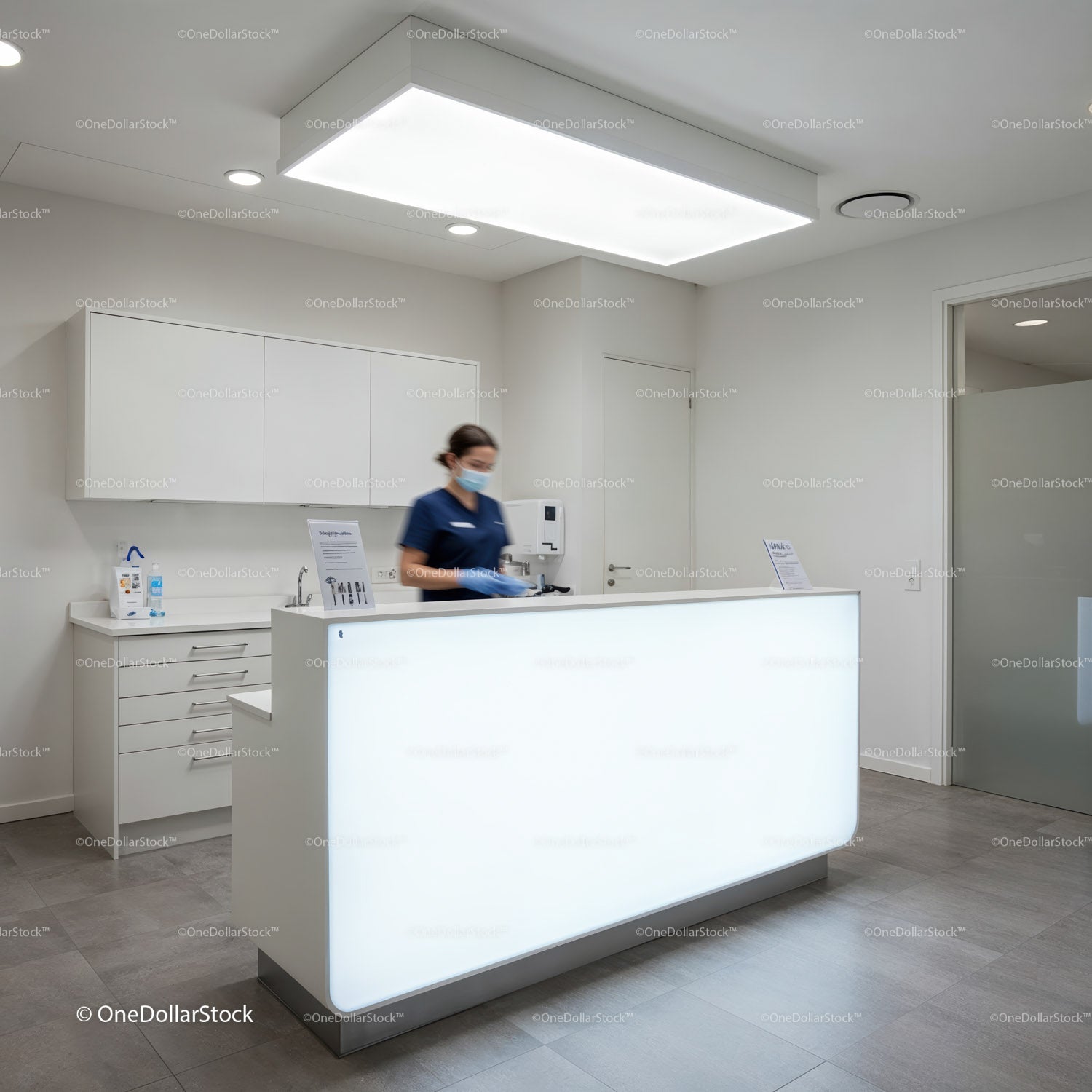 Reception area with nurse preparing medical tools