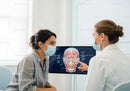 Medical Consultation Between Doctor and Young Woman Patient Discussing Facial Anatomy