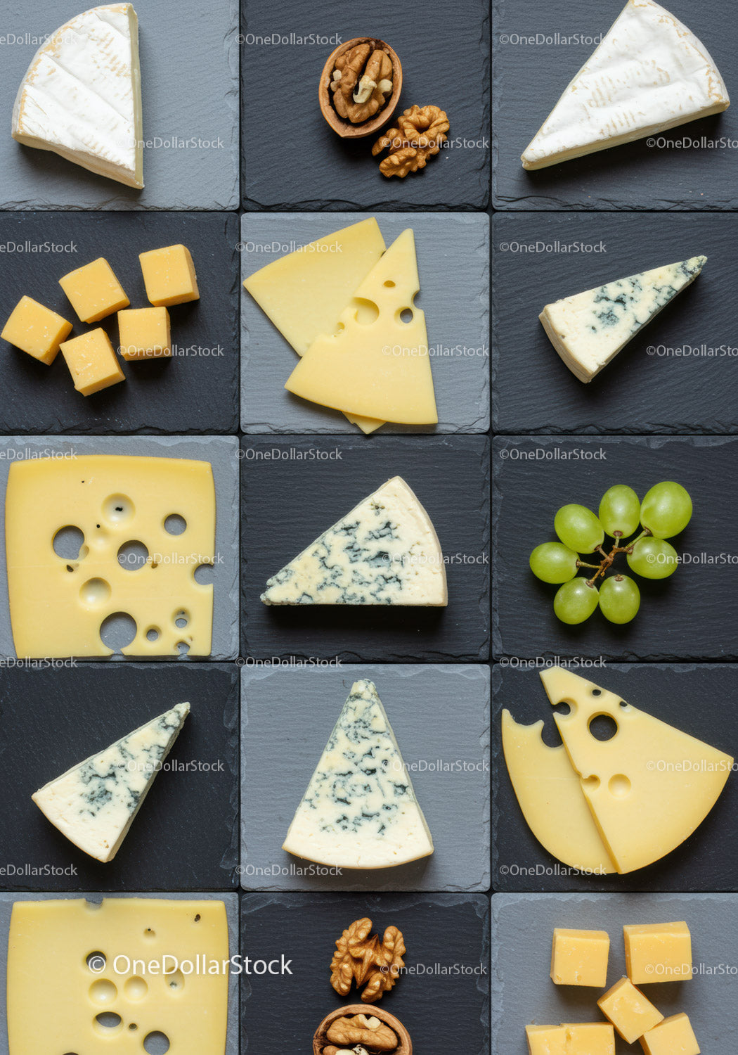 Assorted cheese varieties served on dark slate trays