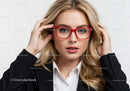 Charming Blonde Woman Wearing Stylish Red Glasses in Professional Setting