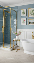 Elegant bathroom with gold accents and blue tiled shower