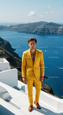 Man in Yellow Suit Posing by Aegean Sea Cliffs