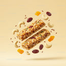 Healthy granola bars with nuts and dried fruits floating