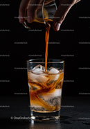 Cold Drink with Coffee Pouring over Ice Cubes