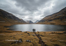 Scenic Mountain Lake with Rugged Valleys and Overcast Sky