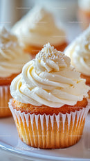 Vanilla Cupcake with Swirled Frosting and Sugar Decorations