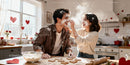 Couple Having Fun Baking Heart Cookies Together