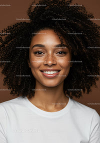 Portrait of Smiling Woman with Curly Hair in Casual Attire