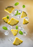 Fresh pineapple slices with ice cubes and mint leaves