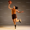 Athletic woman jumping for a basketball dunk