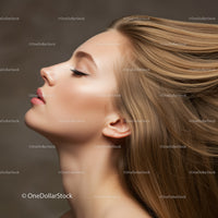 Profile of young woman with flowing blonde hair