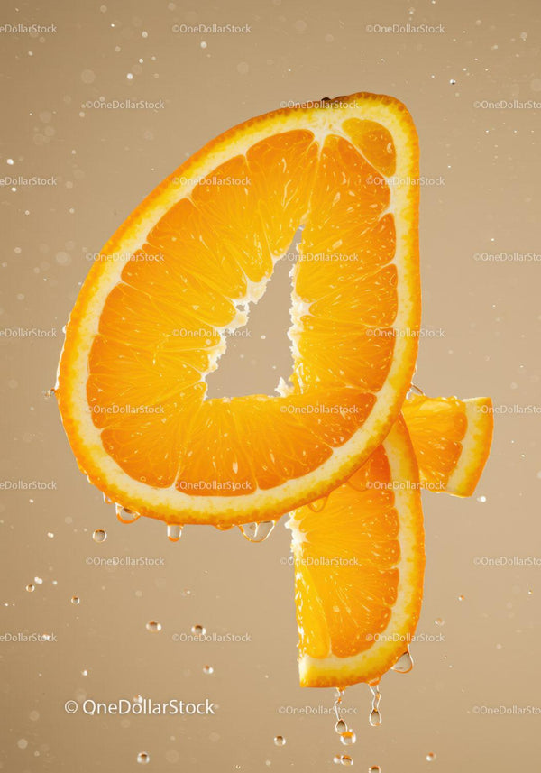 Fresh orange slices forming the number four with water droplets