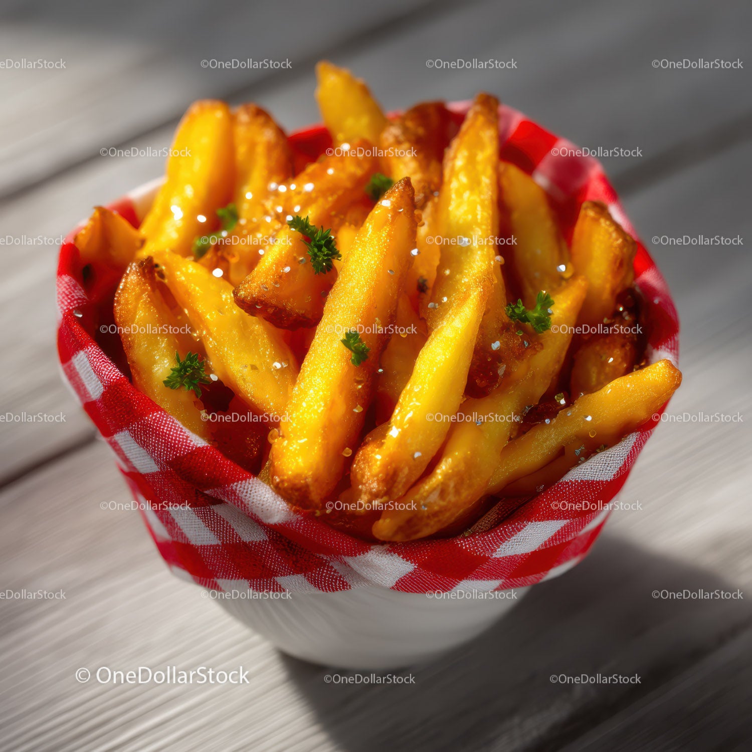Golden French Fries in Checkered Bowl with Parsley Garnish