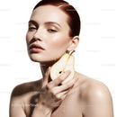 Elegant Portrait of a Woman Holding a Pear for Fresh Beauty and Wellness