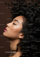Profile of serene woman with curly black hair