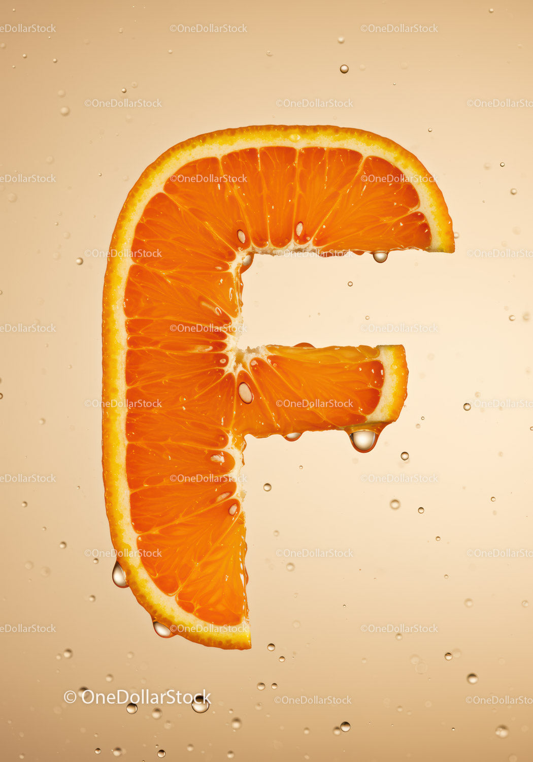 Fresh orange slice shaped like letter F with water droplets