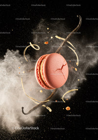 Pink macaron with vanilla sticks and powder splash