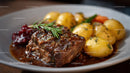 Gourmet Beef Steak with Mashed Potatoes and Herb Garnish