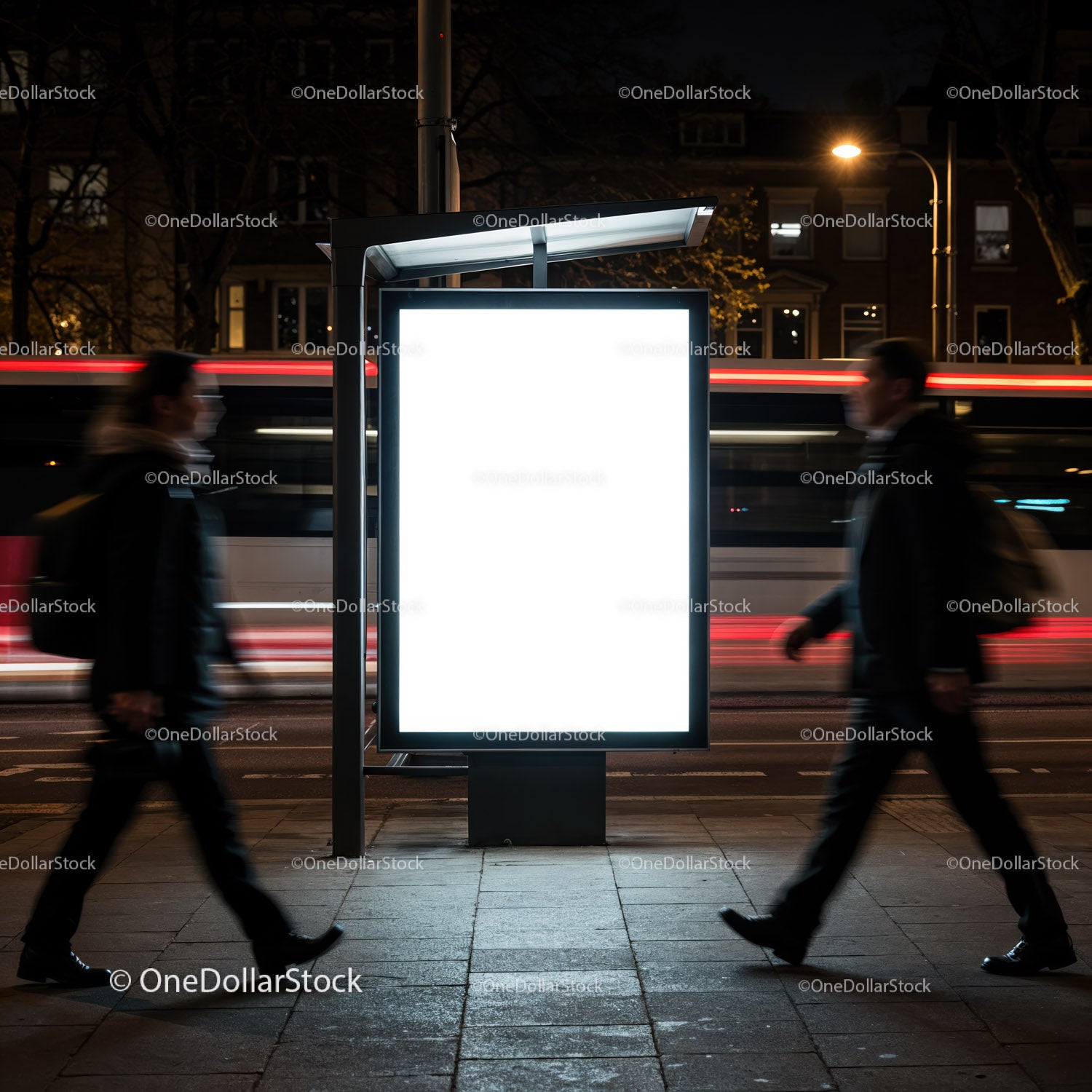 Illuminated bus stop advertising panel at night city street