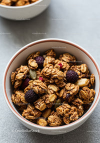 Crunchy granola clusters with mixed berries and seeds