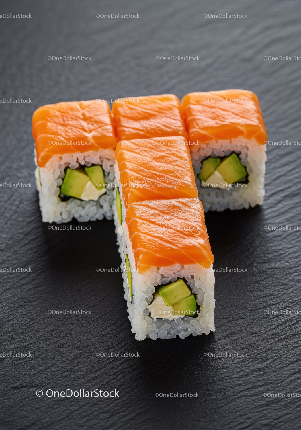 Fresh salmon sushi rolls with avocado and cream cheese