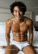 Smiling fit man sitting on bed in white underwear