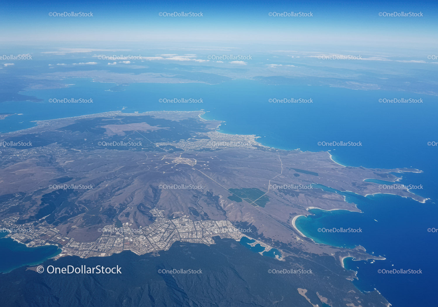 Aerial View of Coastal Mountain Landscape with Turquoise Bays