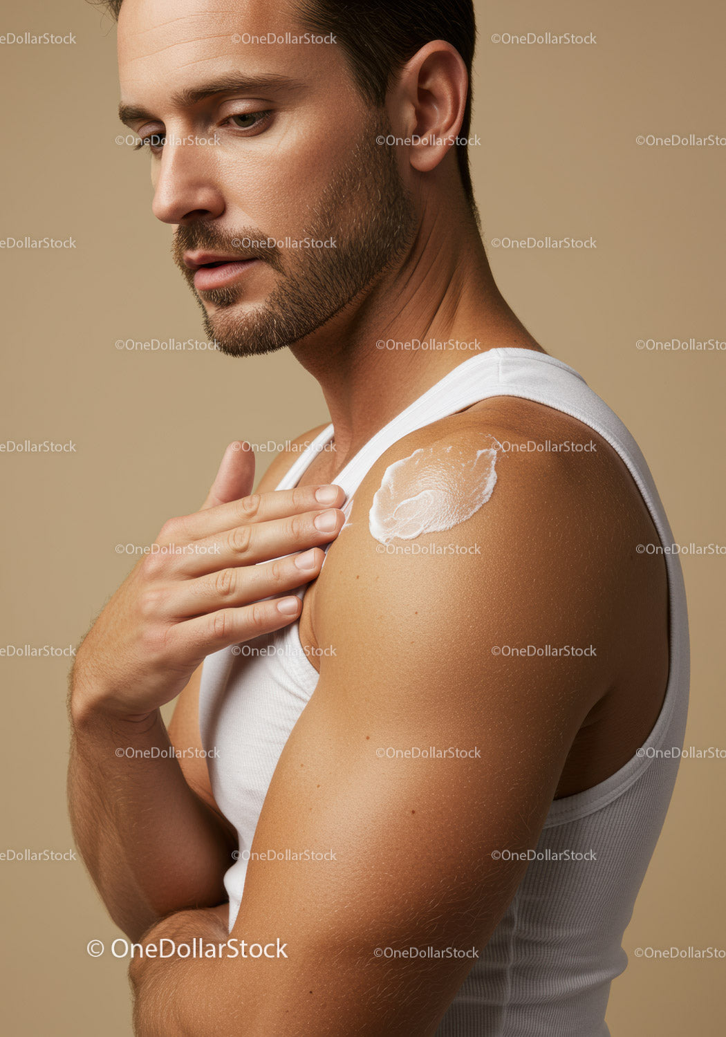 Man Applying Sunscreen Cream on Shoulder for Sun Protection