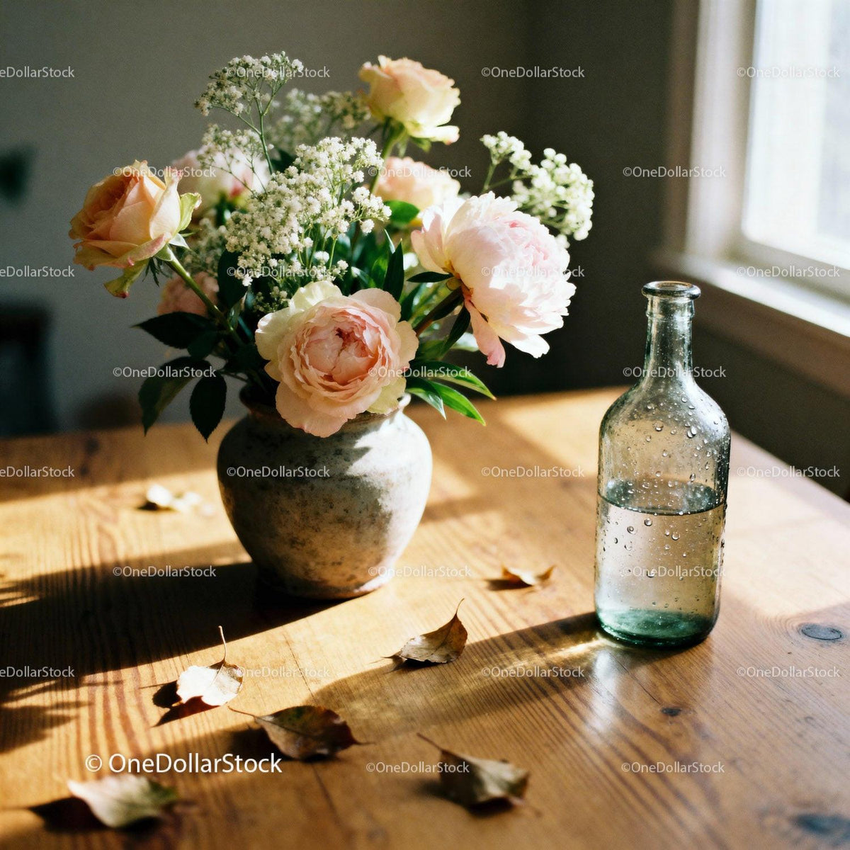 Delicate pink peonies and white blooms in rustic vase