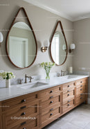 Elegant Bathroom with Double Oval Mirrors and Wooden Vanity