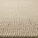 Beige Braided Rug with Textured Woven Pattern for Interior Decor