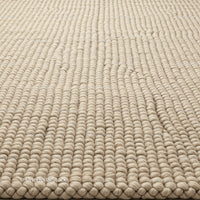 Beige Braided Rug with Textured Woven Pattern for Interior Decor