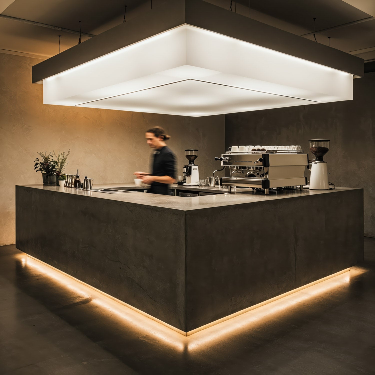 Barista preparing coffee in modern minimalist cafe interior