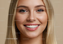 Close up portrait of smiling young woman with glowing skin