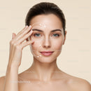 Young Woman Performing Facial Skincare Routine with Markings