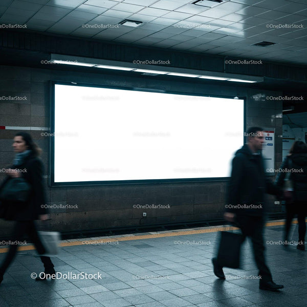 commuters walking past blank illuminated subway billboard JPG Mockup Image