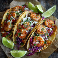 Spicy Shrimp Tacos with Purple Cabbage and Lime Wedges