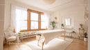Bright Wellness Spa Room with Massage Table and Green Plants