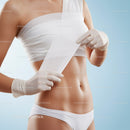 Adult Woman Applying Medical Adhesive Tape to Abdomen for Body Support