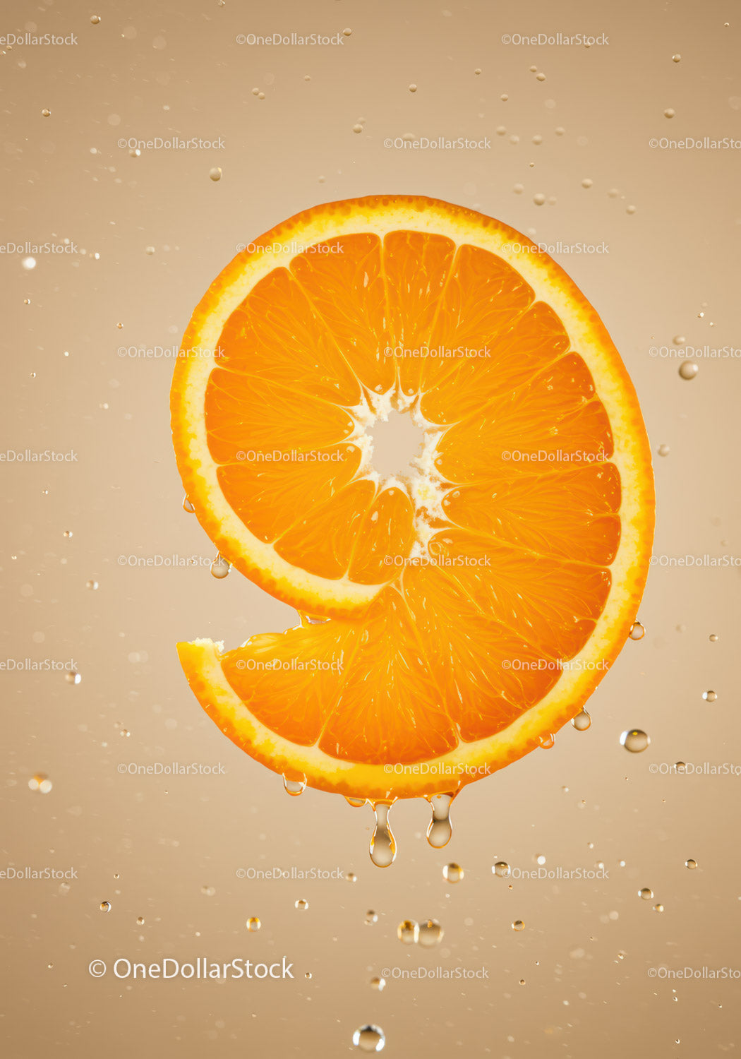 Fresh orange slice with water droplets close up