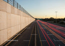 Long Exposure of Highway with Light Trails at Sunset