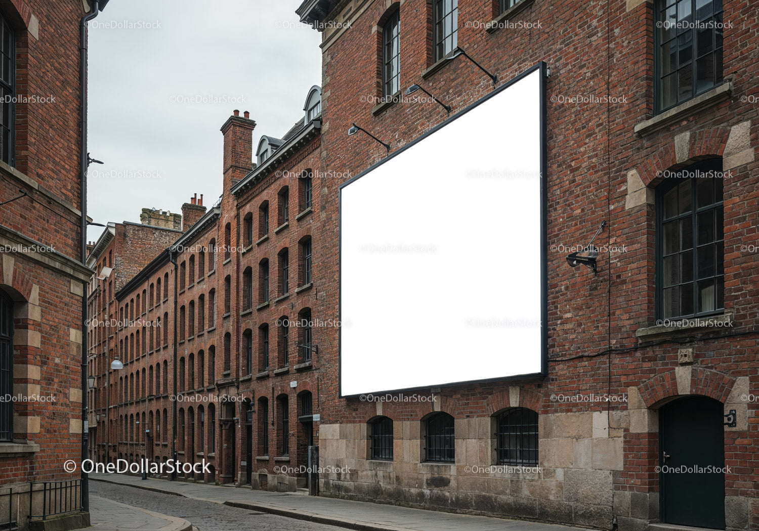 Empty billboard on old red brick building facade