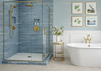 Modern bathroom with blue tile shower and freestanding tub