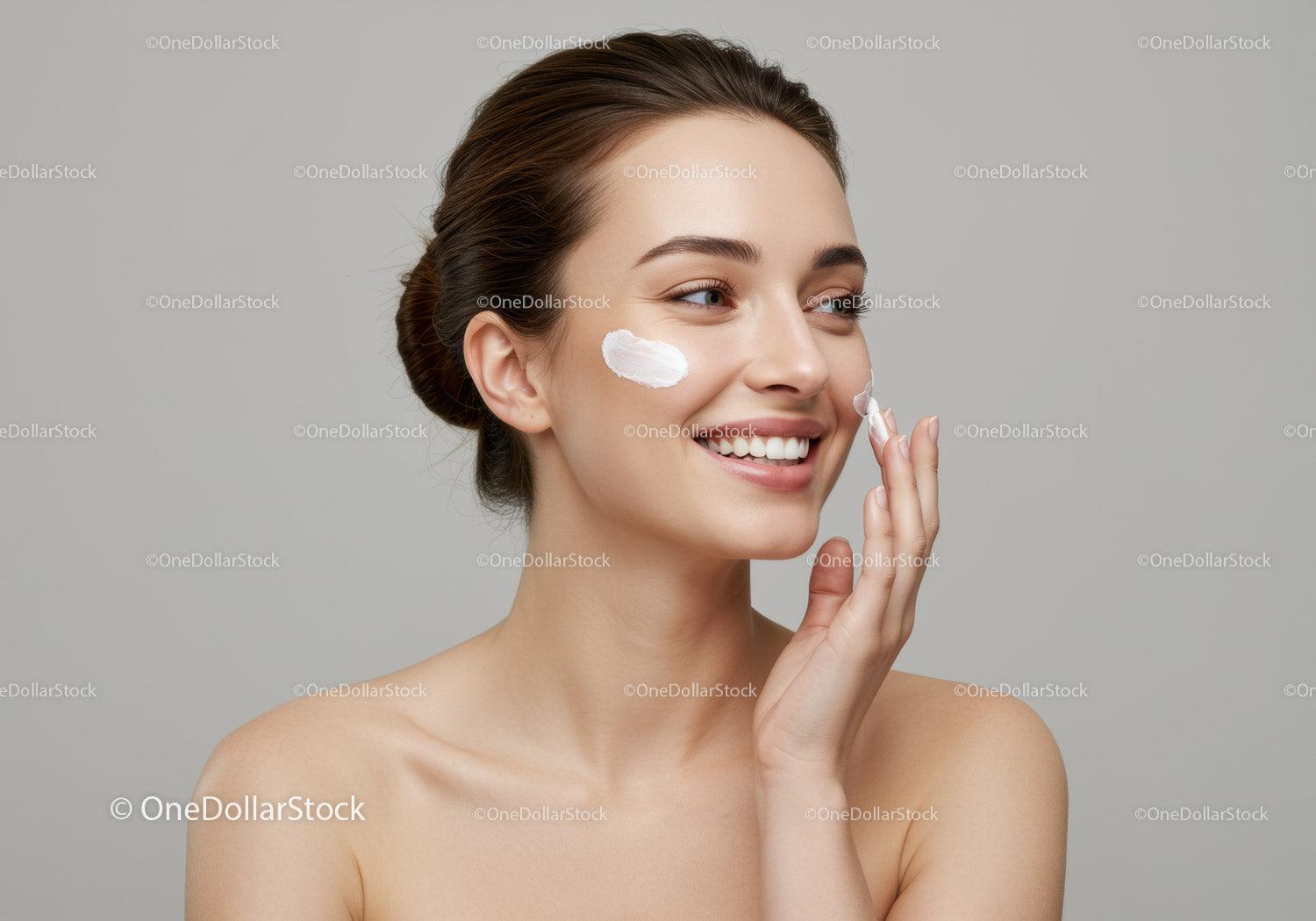 Young Woman Applying Face Cream with Skincare Routine