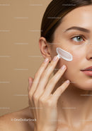 Close-Up of Woman Applying Facial Moisturizer for Healthy Skin