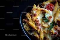Cheesy Baked Pasta with Cherry Tomatoes and Basil