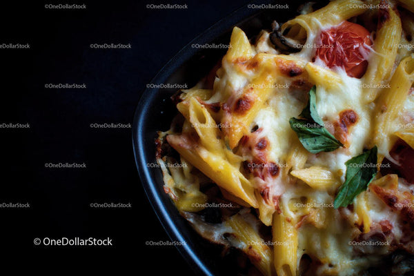 Cheesy Baked Pasta with Cherry Tomatoes and Basil